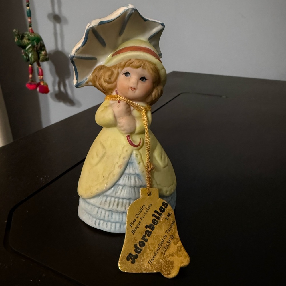 Yellow and Blue Porcelain Figurine